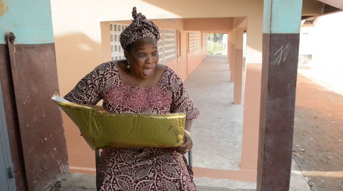 school Ferefou Kindia Guinea happy principal globetops old laptop