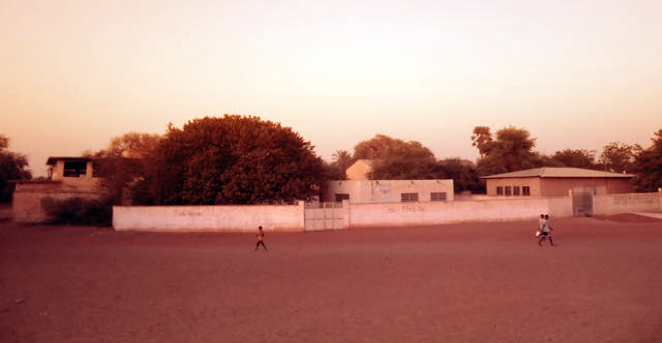 FIGURE 6 | SOCCER PITCH ON THE STREETS OF GUÉDÉ CHANTIER